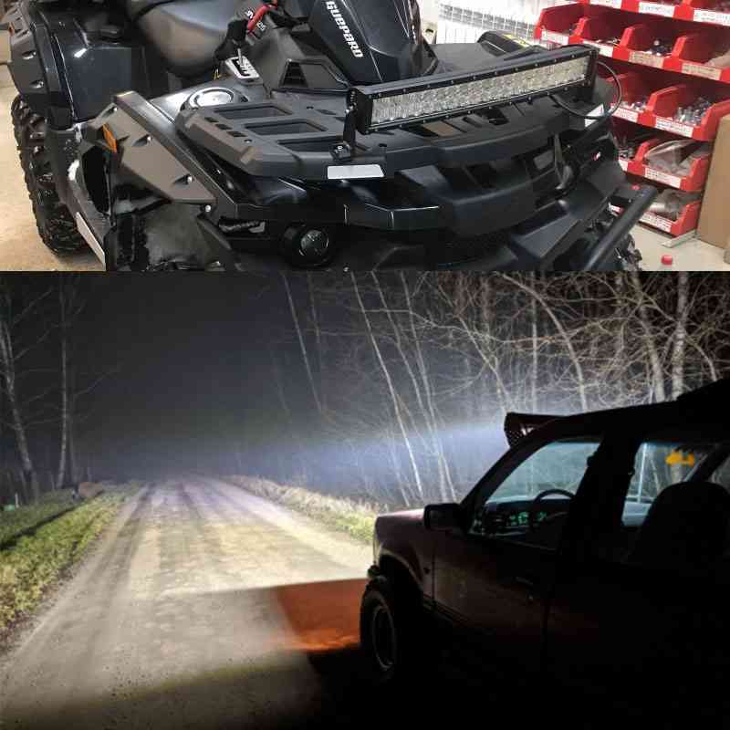 Off-road truck equipped with a durable LED light bar navigating a dark trail at night